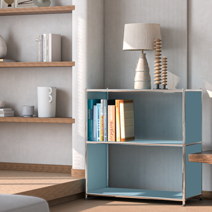 Modern metal bookcase with books and table lamp in minimalist living room
