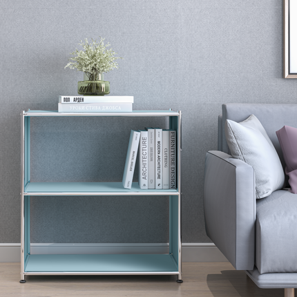 Light blue metal open shelf bookcase beside bed with books and decor in bedroom
