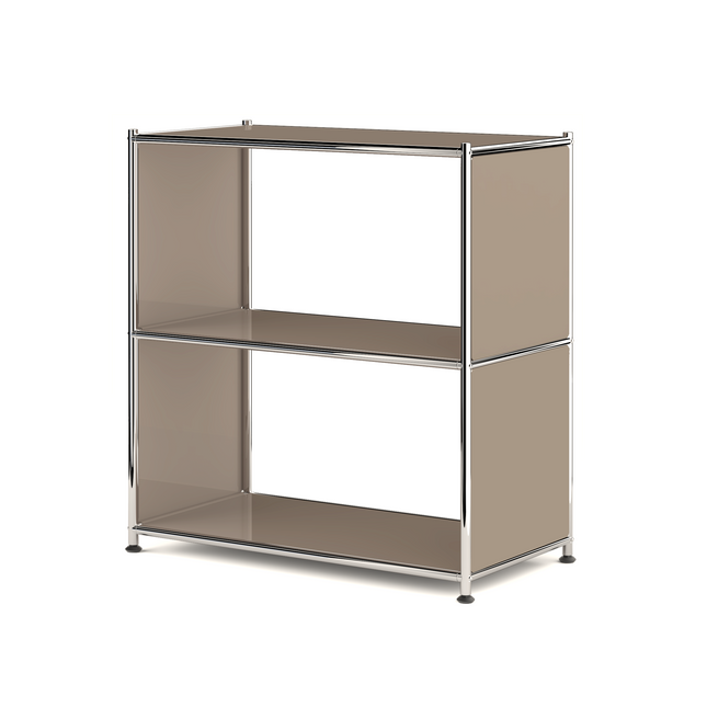 Metal bookcase with open shelves and chrome frame on white background