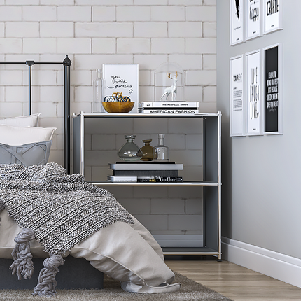Gray metal bookcase used as bedside storage next to bed in modern bedroom
