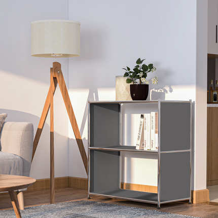 Gray metal bookcase beside a floor lamp with books and plants in a modern living room
