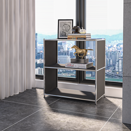 Gray metal open bookcase with two shelves placed by a window in a modern living room

