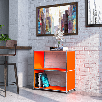 Orange metal bookcase styled in modern living room with books, artwork, and plant
