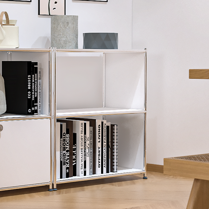 White metal bookcase with open shelves displaying books in a modern living space
